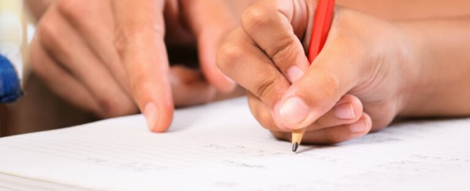 Child working with a tutor